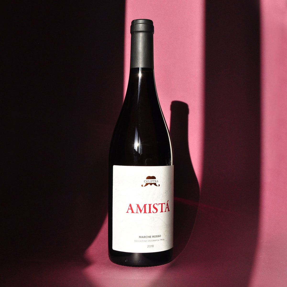 Full bottle of Ca’Liptra Amista, a natural Italian red wine made with organic Montepulciano and Sangiovese, expressing the freshness and vibrancy of Cupramontana terroir