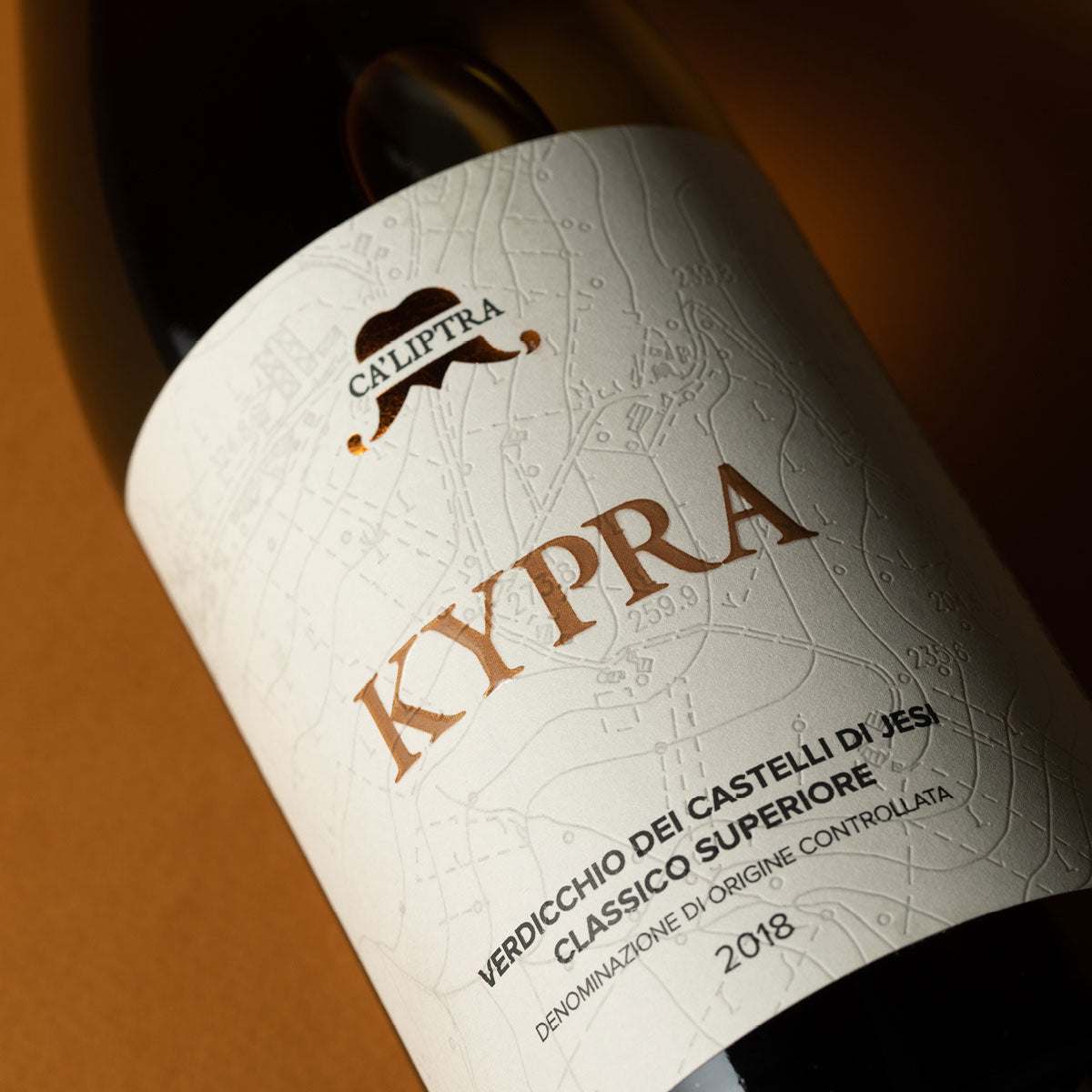 Close-up of Ca’Liptra Kypra label, a natural Verdicchio wine from Cupramontana, Italy - highlighting artisanal design and small-scale organic winemaking in the Marche region
