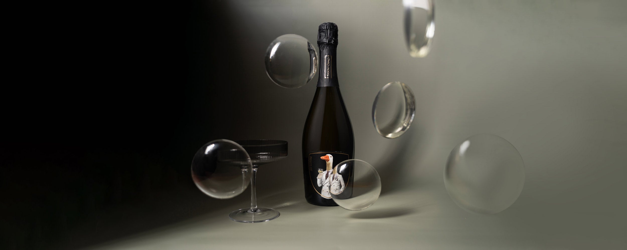 Styled image of Fasoli Gino Prosecco with rising bubbles — a biodynamic sparkling wine from Veneto, Italy, perfect for aperitivo moments and celebrations