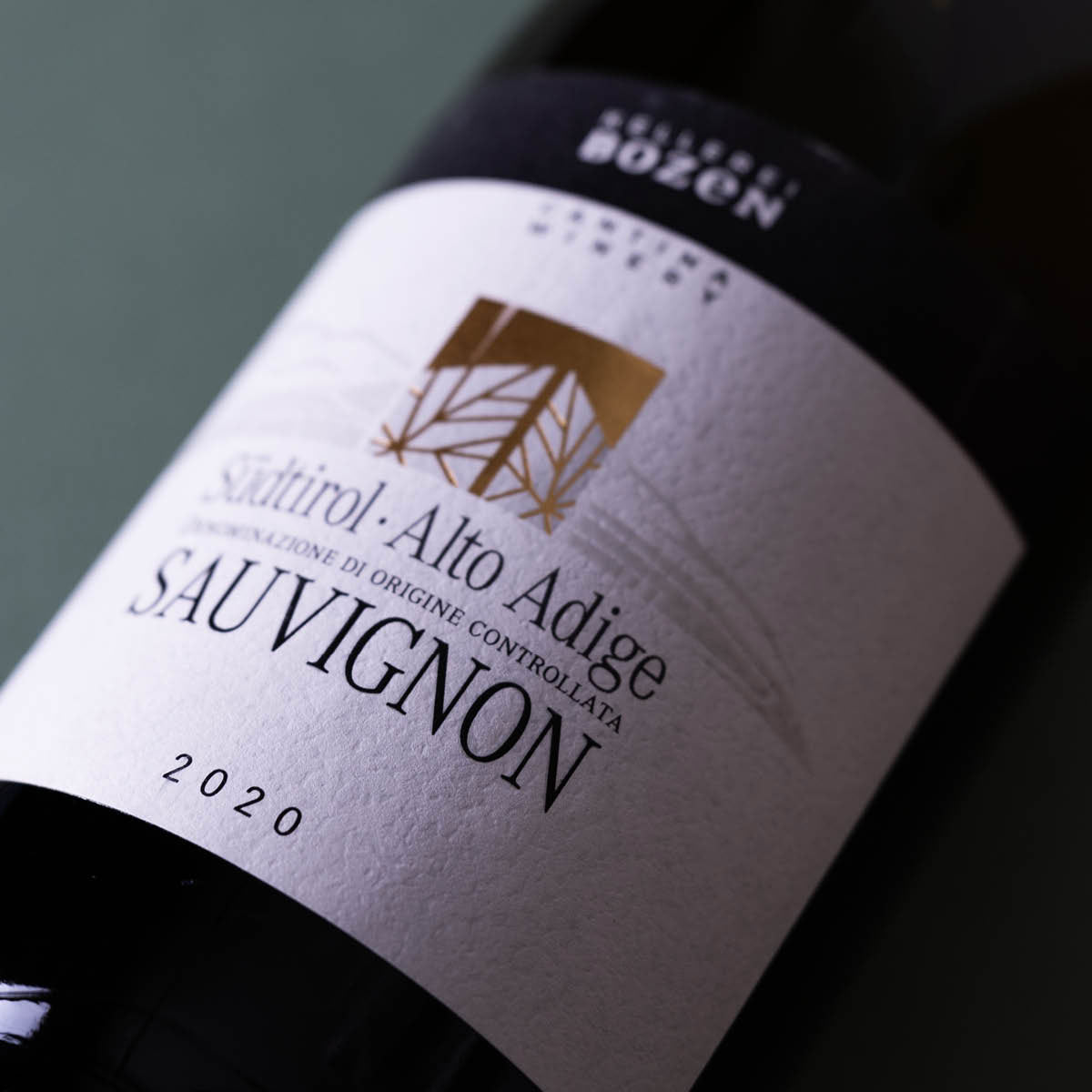 Close-up of Kellerei Bozen Sauvignon Blanc label — a sustainable white wine from Alto Adige, known for its vibrant acidity and aromatic precision