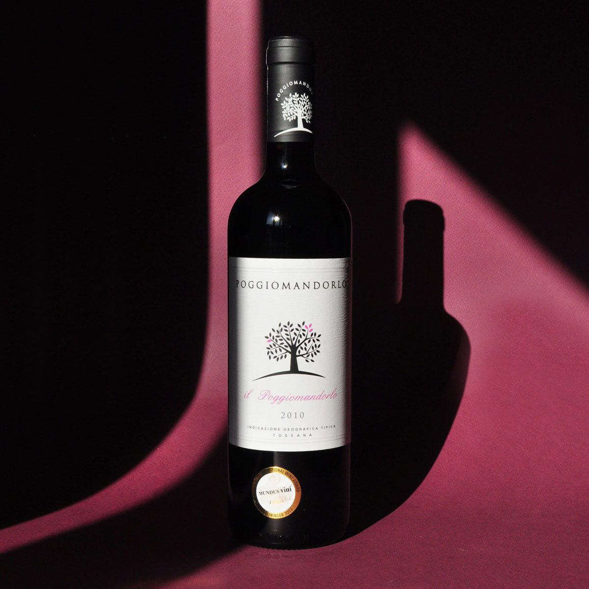 Styled image of Poggio Mandorlo’s Il Guardiano — a bold yet approachable Tuscan red wine, ideal for rustic meals and casual elegance