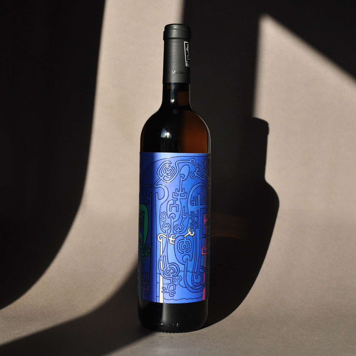 Styled image of Vigneti Vallorani’s Le Fric — a vibrant, natural orange wine from Marche, ideal for adventurous pairings and lovers of wild, textured whites