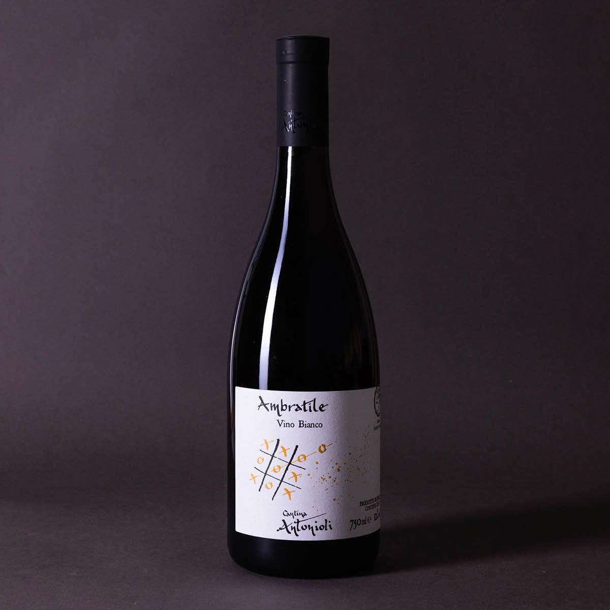 Styled image of Cantina Antonioli’s Ambratile — a mountain white wine from Valtellina, showcasing purity, freshness, and artisanal alpine viticulture