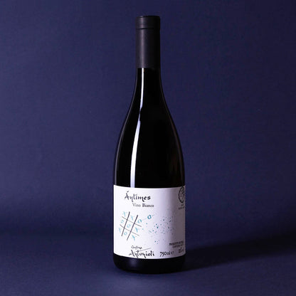 Cantina Antonioli’s Antìmes featured in a styled setting — a high-altitude natural white wine from Valtellina, crisp and pure with alpine character