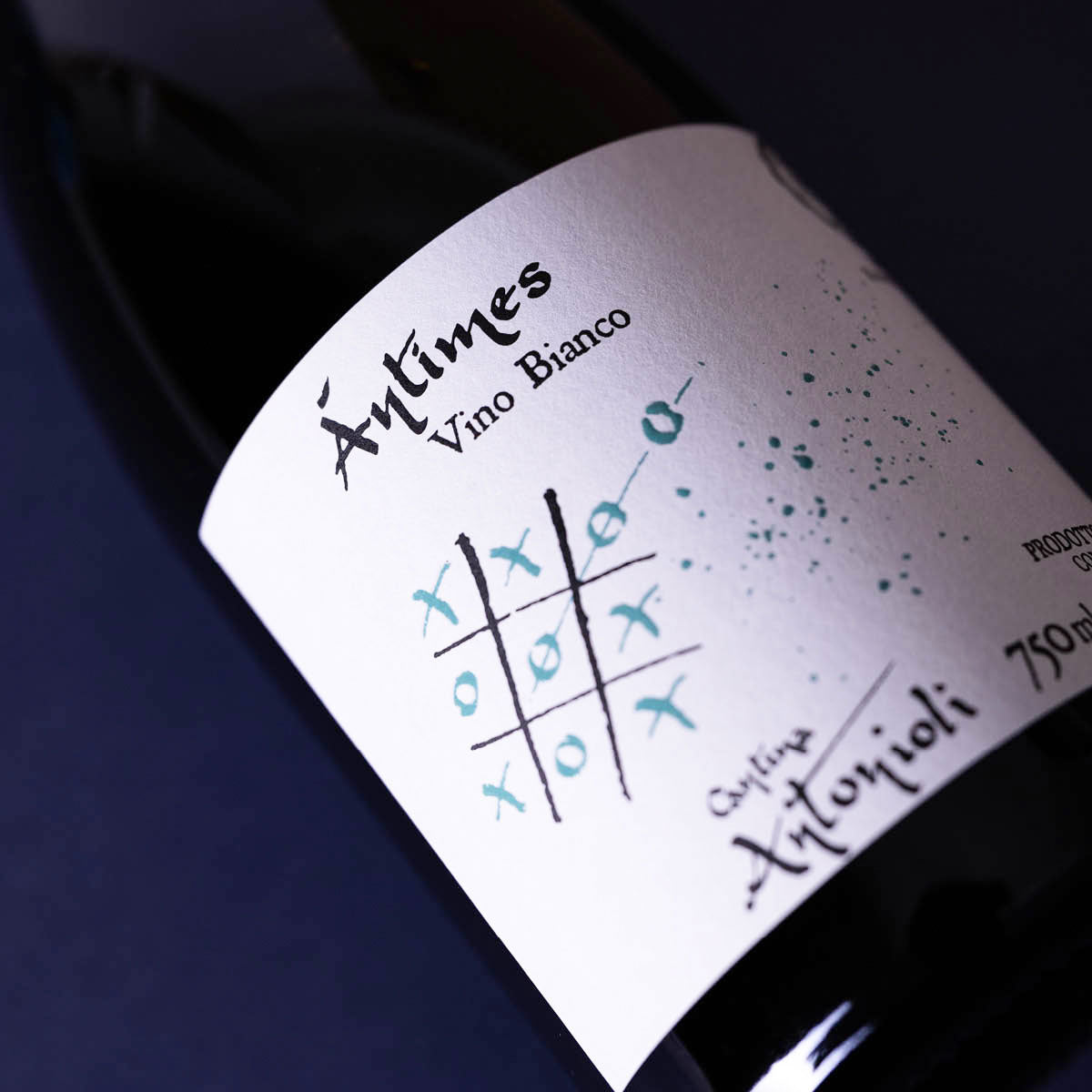 Close-up of Cantina Antonioli Antìmes label, a natural white wine from Valtellina — expressing mountain freshness and precision through low-intervention winemaking