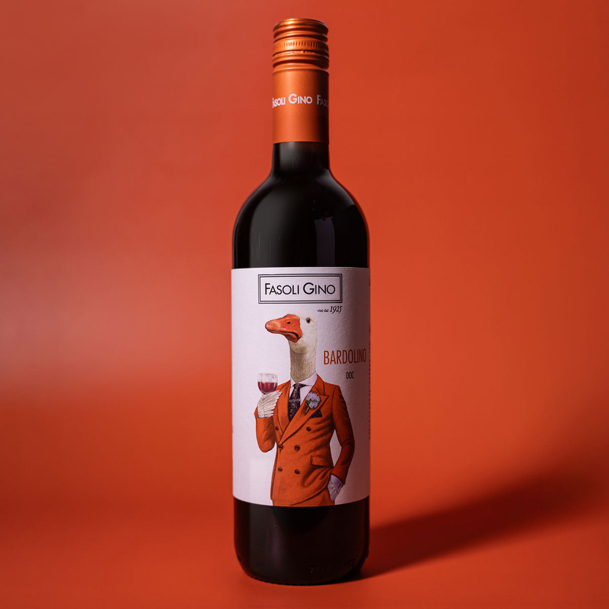 Styled image of Fasoli Gino Bardolino — a vibrant, natural red wine from Verona, ideal for casual meals and warm-weather sipping