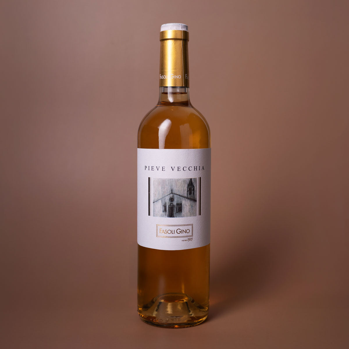 Styled image of Fasoli Gino’s Pieve Vecchia — a rich, complex Italian white wine from Veneto, reflecting meticulous biodynamic farming and artisanal winemaking