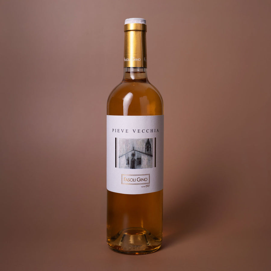 Styled image of Fasoli Gino’s Pieve Vecchia — a rich, complex Italian white wine from Veneto, reflecting meticulous biodynamic farming and artisanal winemaking