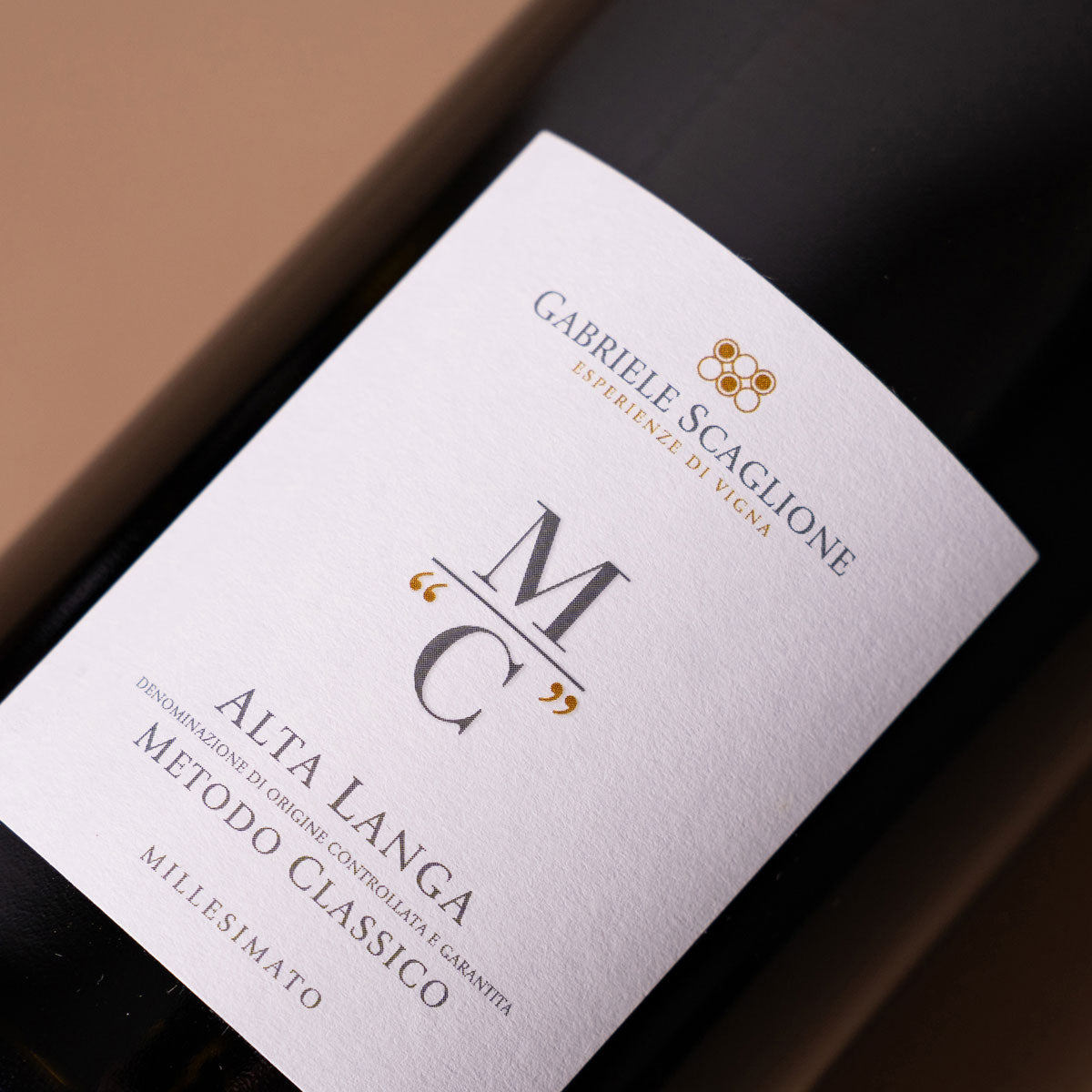 Close-up of Gabriele Scaglione Alta Langa label — a traditional-method sparkling wine from Piedmont, made sustainably with Pinot Noir and Chardonnay
