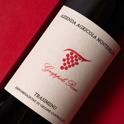 Close-up of Montemelino Grappolo Rosso label — an organic red wine from Umbria, reflecting traditional winemaking and native grape expression