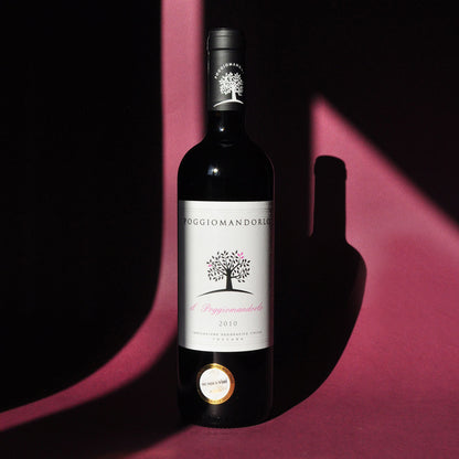 Styled image of Poggio Mandorlo’s Il Guardiano — a bold yet approachable Tuscan red wine, ideal for rustic meals and casual elegance