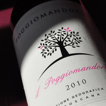 Close-up of Poggio Mandorlo Il Guardiano label — a sustainable Sangiovese-based red wine from Montecucco, Tuscany, expressing vibrant fruit and regional character