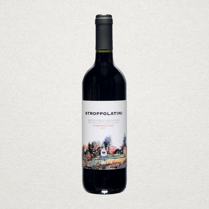 Full bottle of Stroppolatini Schioppettino — an organic red wine from Friuli, showcasing peppery notes, wild berries, and minimal-intervention winemaking