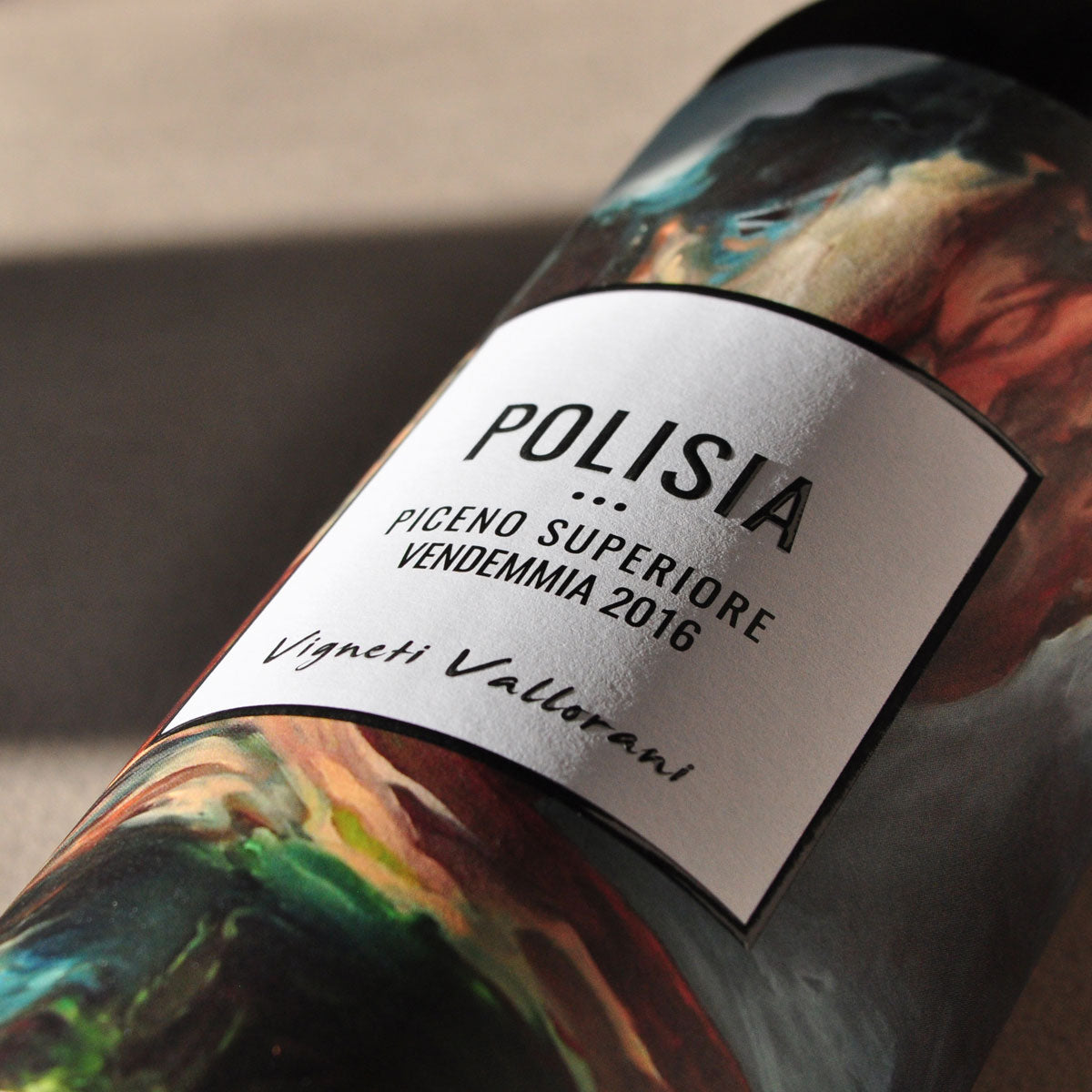 Close-up of Vigneti Vallorani Polisia label — a natural and organic red wine from Marche, showcasing native varietals and expressive, terroir-driven winemaking